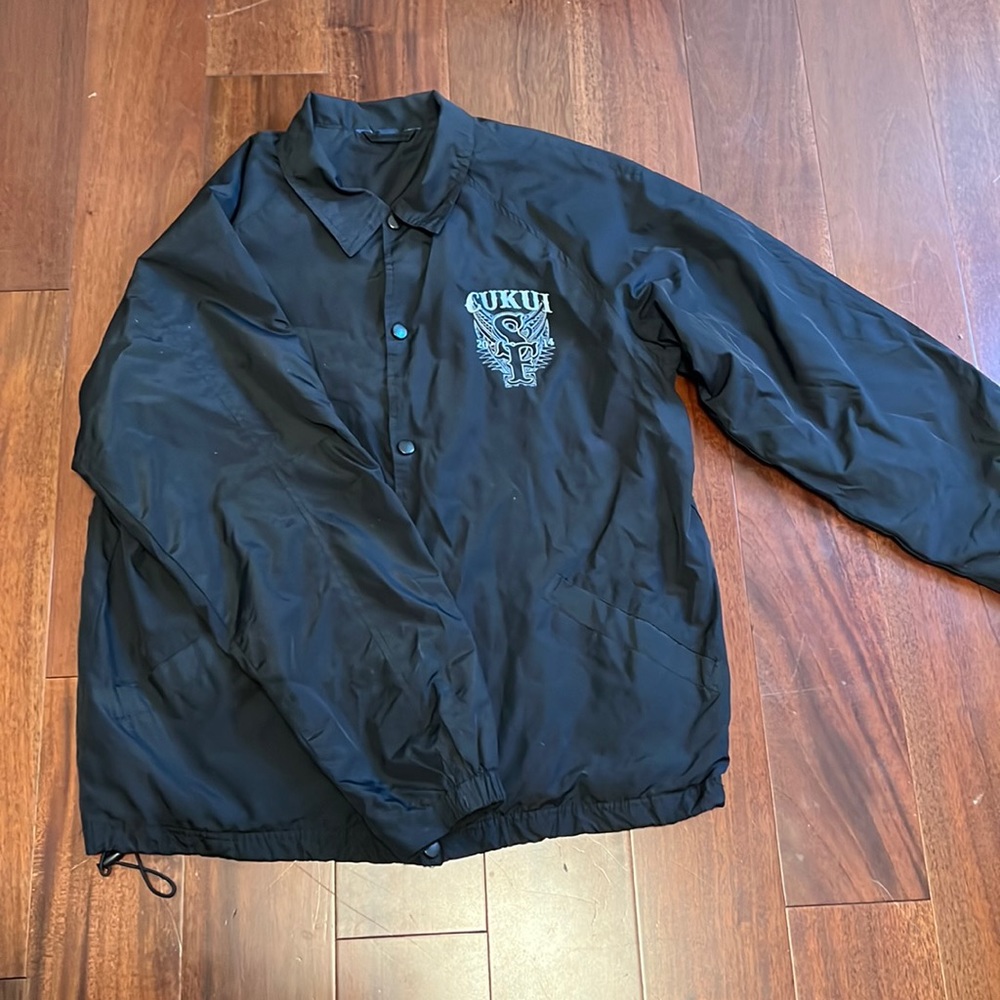 Cukui: black windbreaker